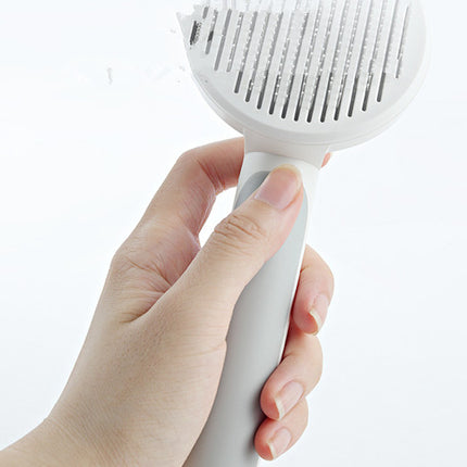 Self-Cleaning Round Handle Pet Grooming Comb with Stainless Steel Needles for Cats & Dogs